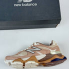 New Balance sneaker with a multicolor design on a white background
